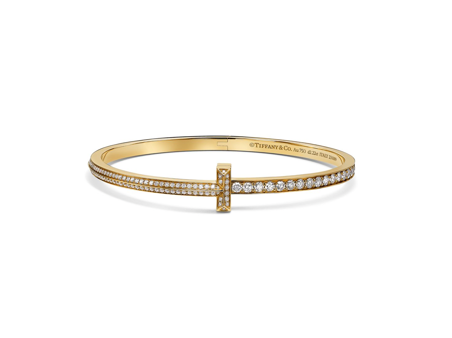 Tiffany T T1 Narrow Pavé Diamond Hinged Bangle in Yellow Gold, $23,000 (approx. P1,273,290), TIFFANY & CO., tiffany.com